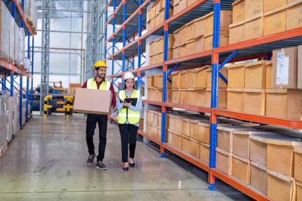 Logistics team reviewing warehouse operations